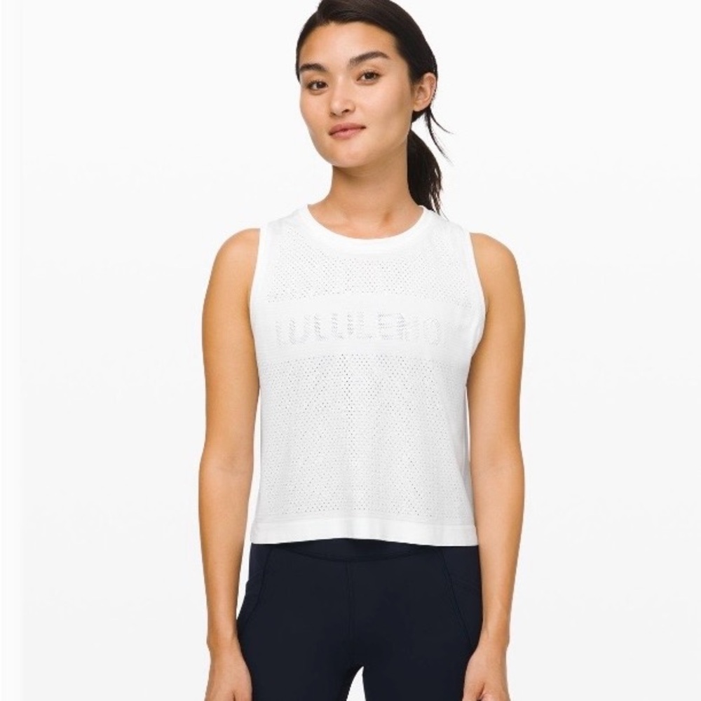 White lululemon breeze by muscle crop top size 10